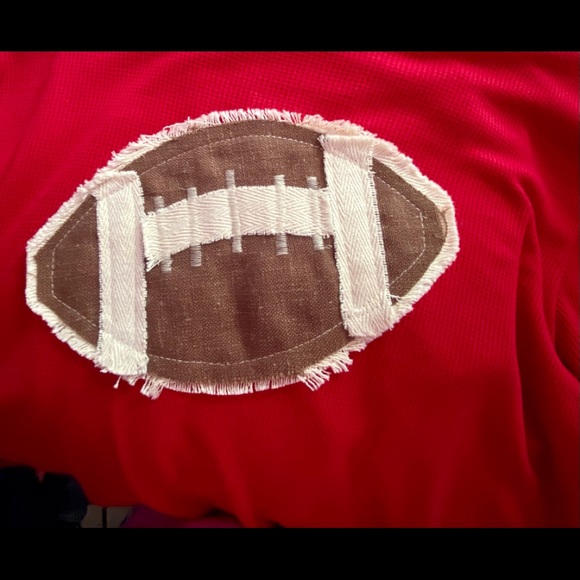 Distressed appliqué football on a thermal shirt - Picture 2 of 15
